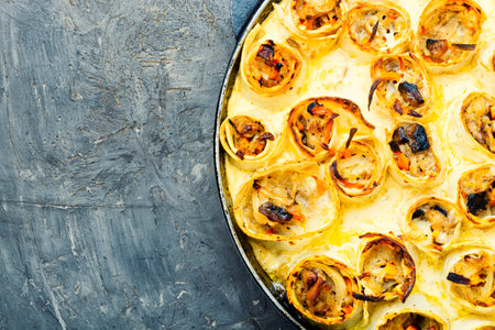 Vegetables baked with cheese in pita bread. Casserole in a pan. Space for textの写真素材