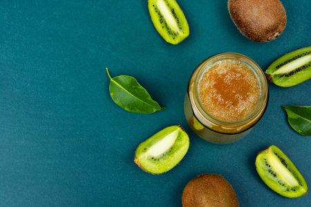 Delicious kiwi jam in a glass jar. Top view, copy space.の写真素材