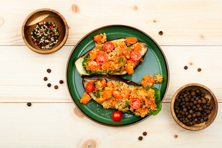 Eggplant stuffed with pumpkin, quinoa and tomato.の写真素材