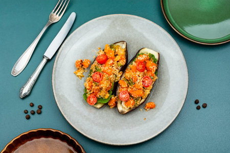 Grilled eggplant stuffed with pumpkin and quinoa. Vegetarian food recipeの写真素材