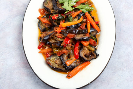 Roast fried vegetable saute with eggplant. Vegetarian food.の写真素材
