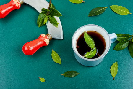 Cup of freshly tea with bay leaves. Bay leaf infusion.
