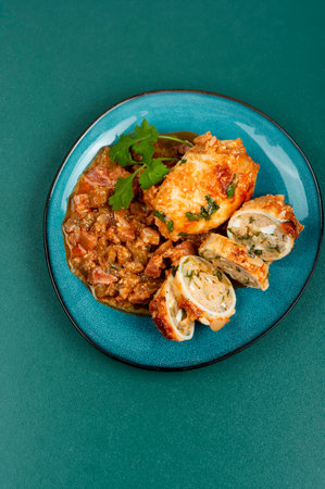 Baked clams, squid stuffed with rice and herbs. Top view.の写真素材