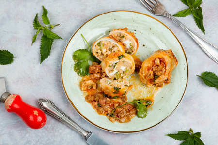 Sliced baked clams, squid stuffed with rice and nettle on a light grey background. Korea food.の写真素材
