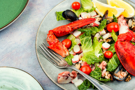 Mix of salad with oysters, mussels, lobster and vegetables.の写真素材