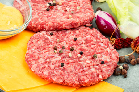 Fresh raw ground beef burgerの写真素材