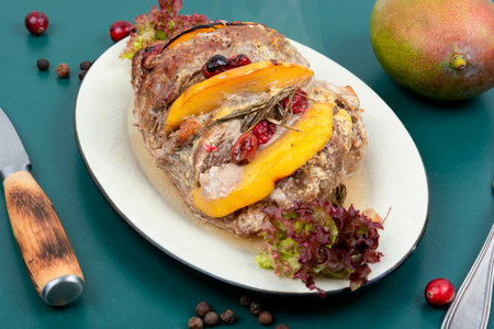 Homemade pork roll baked with aromatic mango pieces.の写真素材