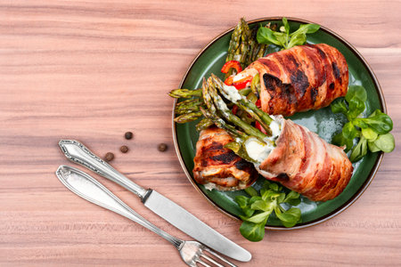 Roasted meat rolls or beef roulade stuffed with asparagus. Copy space.の写真素材