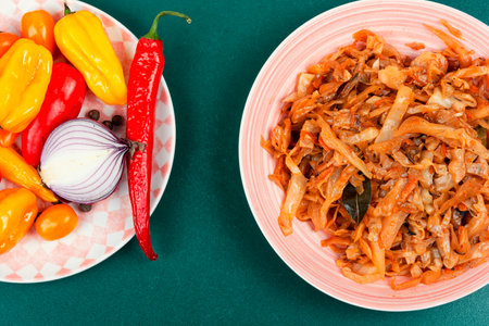 Appetizing stewed cabbage on a plate. German cuisine.