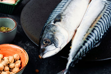 Raw delicious mackerels or scomber and ingredients for cooking. Raw uncooked fish.の写真素材