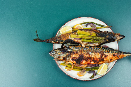 Aromatic mackerel scomber fish baked with green asparagus. Menu recipe place. Space for text.の写真素材