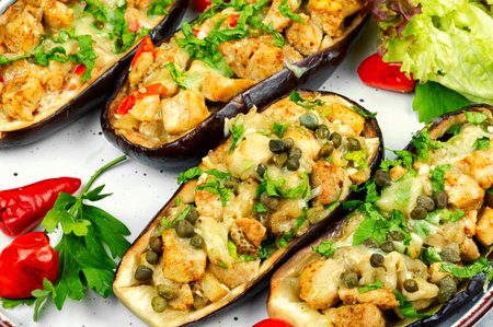 Delicious eggplants stuffed with meat and spices, baked eggplants garnished with fresh parsley.の写真素材