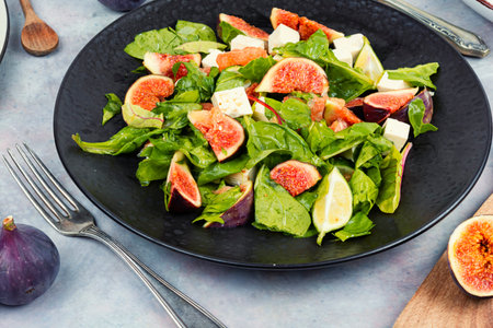 Fig salad with feta cheese.Delicious summer salad with sweet figs, white feta cheese.