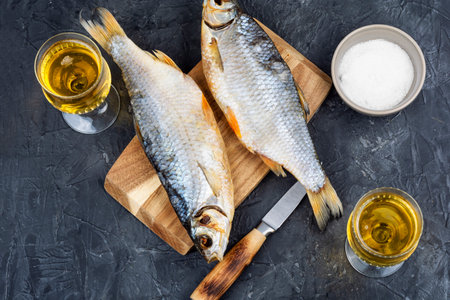 Dried fish with drinks.の写真素材