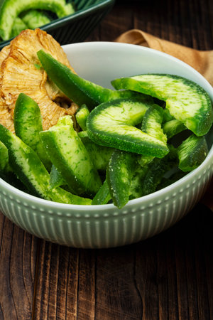 Mix of dried and candied fruit. Candied kiwi, mango and pineapple rings. Dried crystallized kiwis.の写真素材