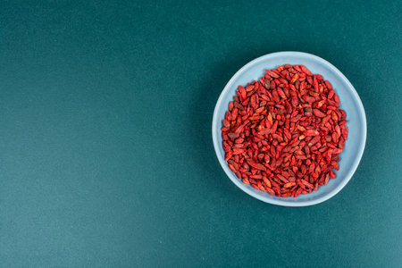 Dried Goji Berries in Bowl, Healthy Food, Superfood. Space for text.の写真素材