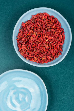 Superfood. Vegetarian, vegan. Portion of Goji Berries or Wolfberry. Overhead view.