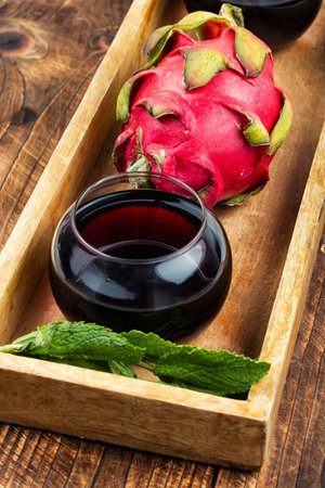 Natural squeezed fresh juice or juice from dragon fruit in glass glasses. Food photographyの写真素材