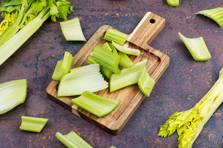 Freshly cut celery stalks ready to be enjoyed, vegan cuisine.の写真素材