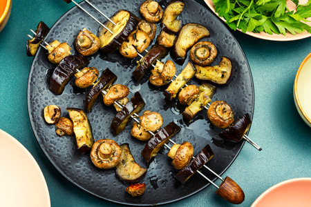 Veggie Skewers - Vegan vegetable skewers with bell eggplants, zucchini, mushrooms. Top view.の写真素材