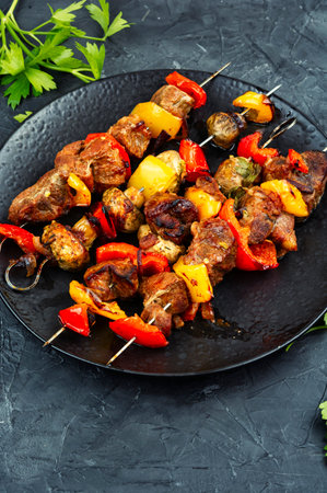 Juicy grilled meat on skewers, fried meat, shashlik.の写真素材