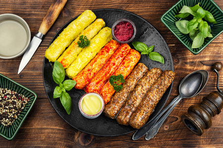 Raw veal sausages, delicious assortment sausages ready for grilling. Barbeque grill.の写真素材