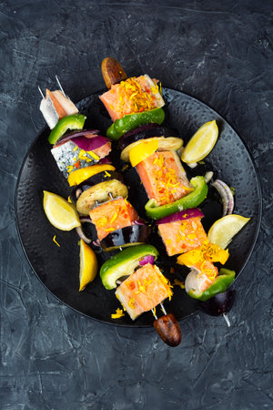 Raw salmon skewers on skewers, fresh seafood on skewers.の写真素材
