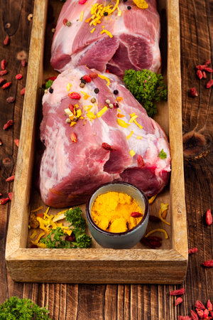 Aromatic meat, pork and veal with spices and ingredients for cooking. Rustic style.の写真素材