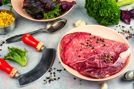 Raw piece of beef ready for cooking, uncooked veal meat.の写真素材