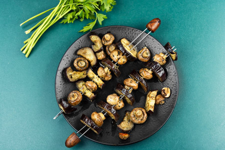 Veggie Skewers - Vegan vegetable skewers with bell eggplants, zucchini, mushrooms. Overhead view.の写真素材