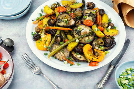 Roasted vegetables in the oven, baked or grilled vegetables. Baked sliced vegetables.の写真素材