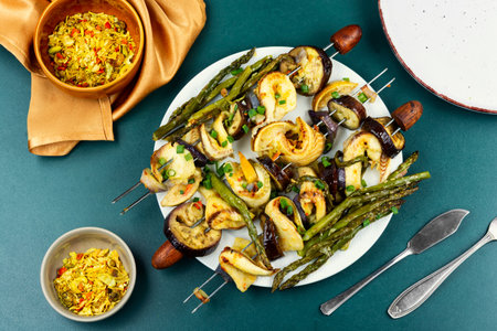 Grilled kebabs with vegetables, asparagus and fish.の写真素材