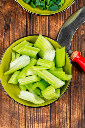 Fresh ripe celery , raw green celery on the kitchen table.の写真素材