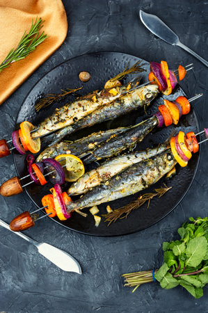 Seafood platter with sardines kebab, grilled fish. Flat layの写真素材