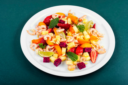Tasty seafood salad and exotic fruits.の写真素材