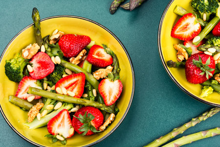 Simple salad with strawberries and asparagus.の写真素材