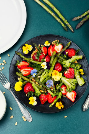 Mixed salad with green asparagus, strawberries.の写真素材