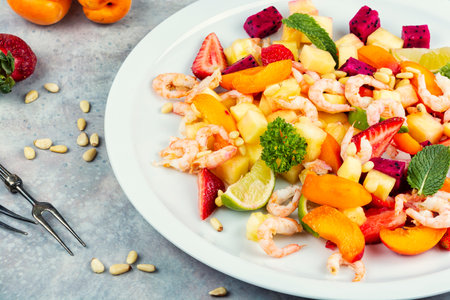 salad featuring shrimp and tropical fruit mix.の写真素材