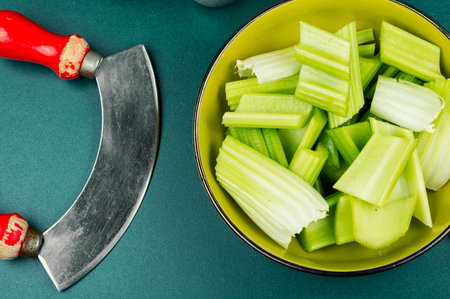 Nutritious vegetable. Sliced fresh celery or Celery stalk
