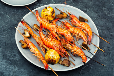 Seafood, shellfish. Langoustines Shrimps Prawns on Wooden Skewers. Barbecue Seafood.の写真素材