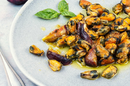 Seafood dish, food photography with fried peeled mussels.の写真素材