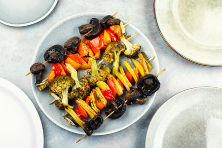 Vegetable skewers,skewers of vibrant vegetables. A plate of colorful vegetable skewers. Flat lay.の写真素材