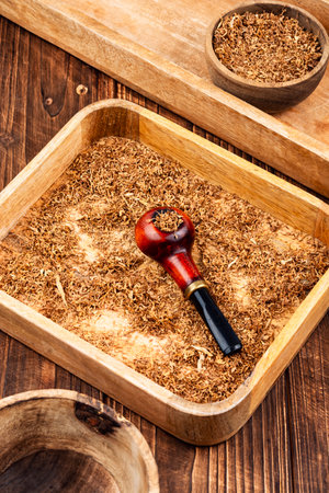 Pipe and pipe smoking utensils, classic tobacco pipe.の写真素材