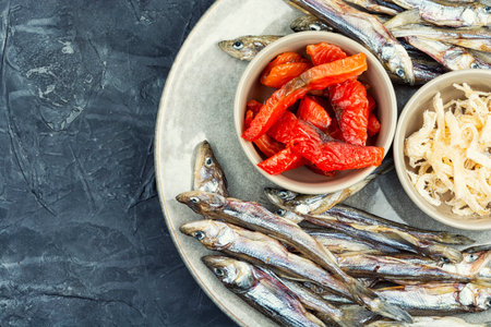 Unfiltered beer and with dried fish and squid.の写真素材