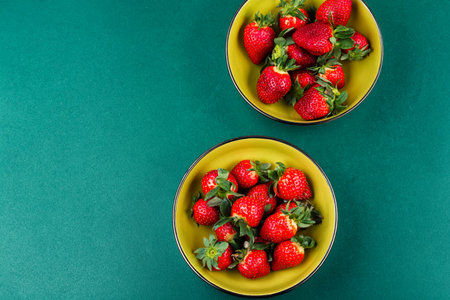 Fresh strawberries ready to eat, clean eating and healthy lifestyle concept. Copy space.の写真素材