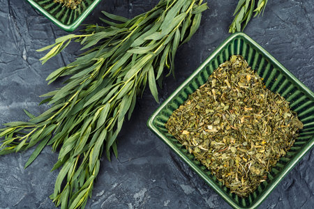 Fresh tarragon leaves and dried herb seasoning