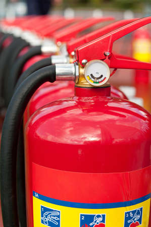 Group of ready fire extinguishers for useの写真素材