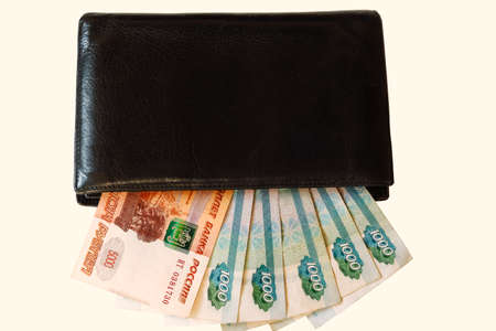 Paper Russian money of various denominations lies in the portmonの写真素材