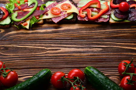 Sandwiches with different meat and vegetables.の写真素材