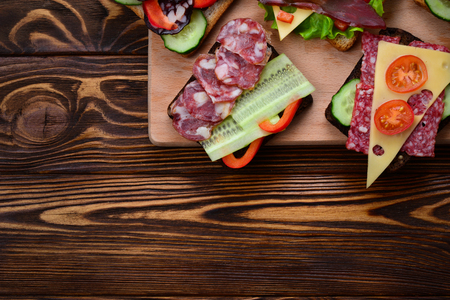Sandwiches with different meat and vegetables.の写真素材